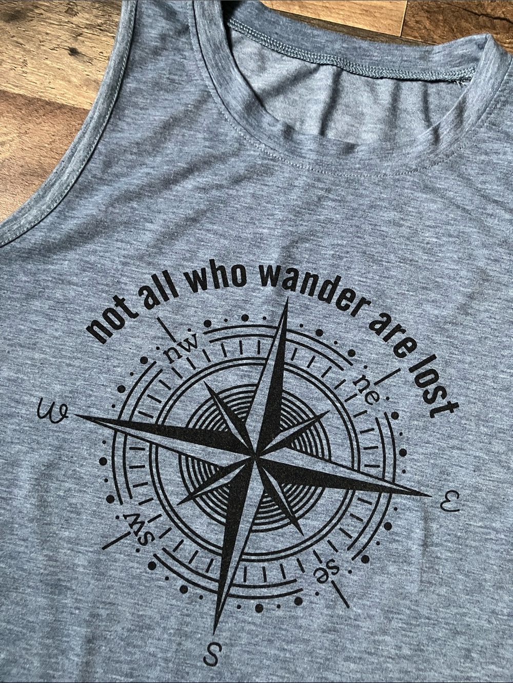 Compass Graphic Sleeveless Tee - “Not All Who Wander Are Lost” - Heather Blue